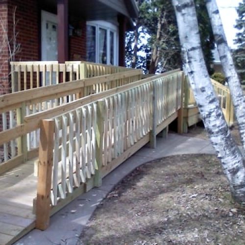 Photograph of a long wooden outdoor ramp built by Adaptive Remodeling Solutions.